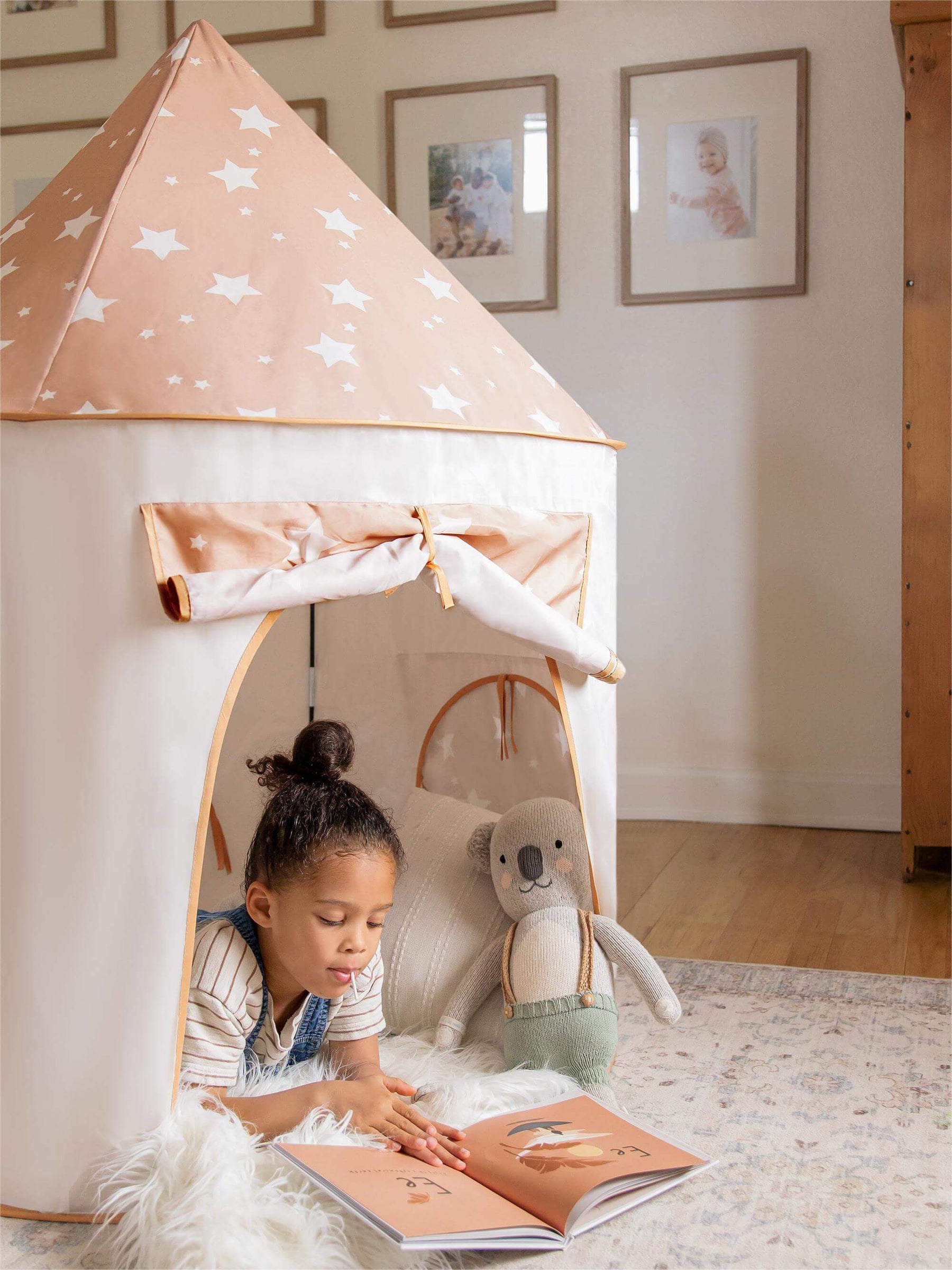 reading book in the play tent